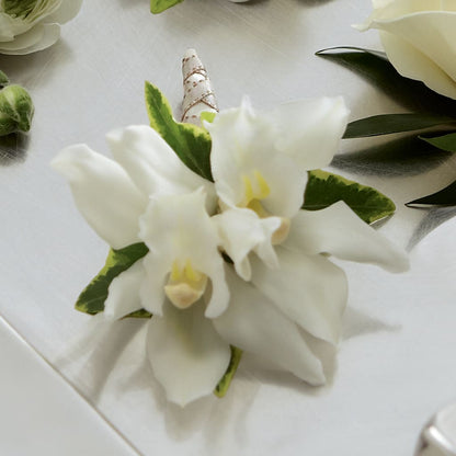 White Mini Cymbidium Boutonniere –  Queen Ofe Florist, San Jose CA